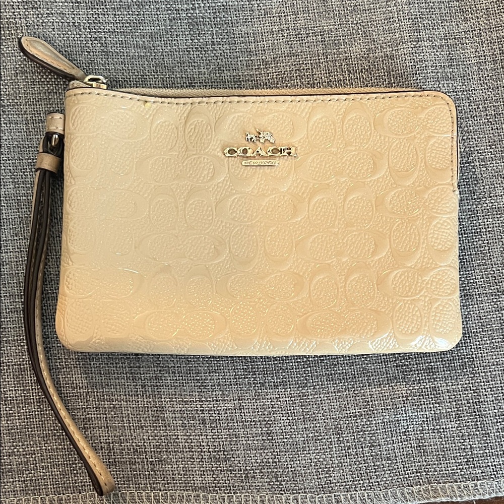 Coach Embossed Cream Wristlet